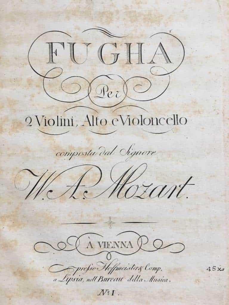 Collection of early/first editions of famous string quartets, bound in 4 half leather volumes (one for each instrument)