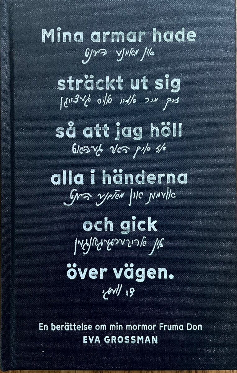 Eva Grossman : Mina armar hade sträckt ut sig så att jag höll alla i händerna och gick över vägen