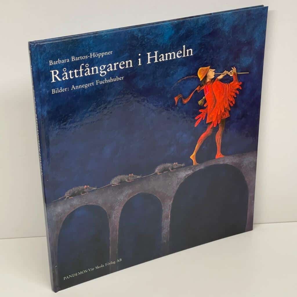 Bartos-Höppner, Barbara (text) ; Fuchshuber, Annegert (bild) : Råttfångaren i Hameln
