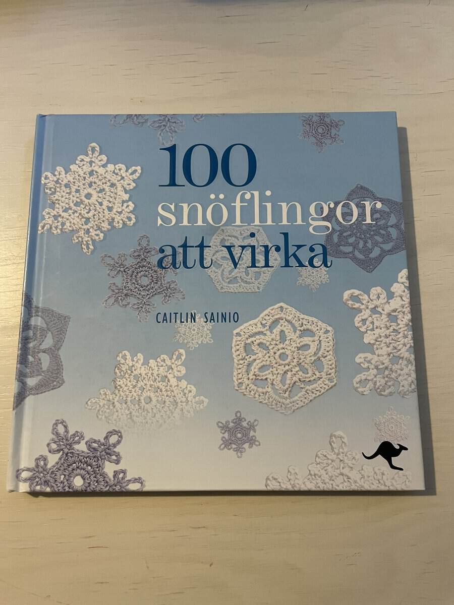 Caitlin Sainio : 100 snöflingor att virka