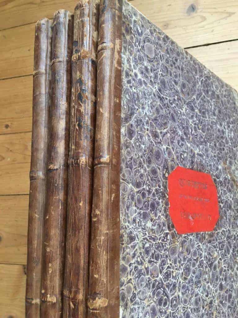 Collection of early/first editions of famous string quartets, bound in 4 half leather volumes (one for each instrument)