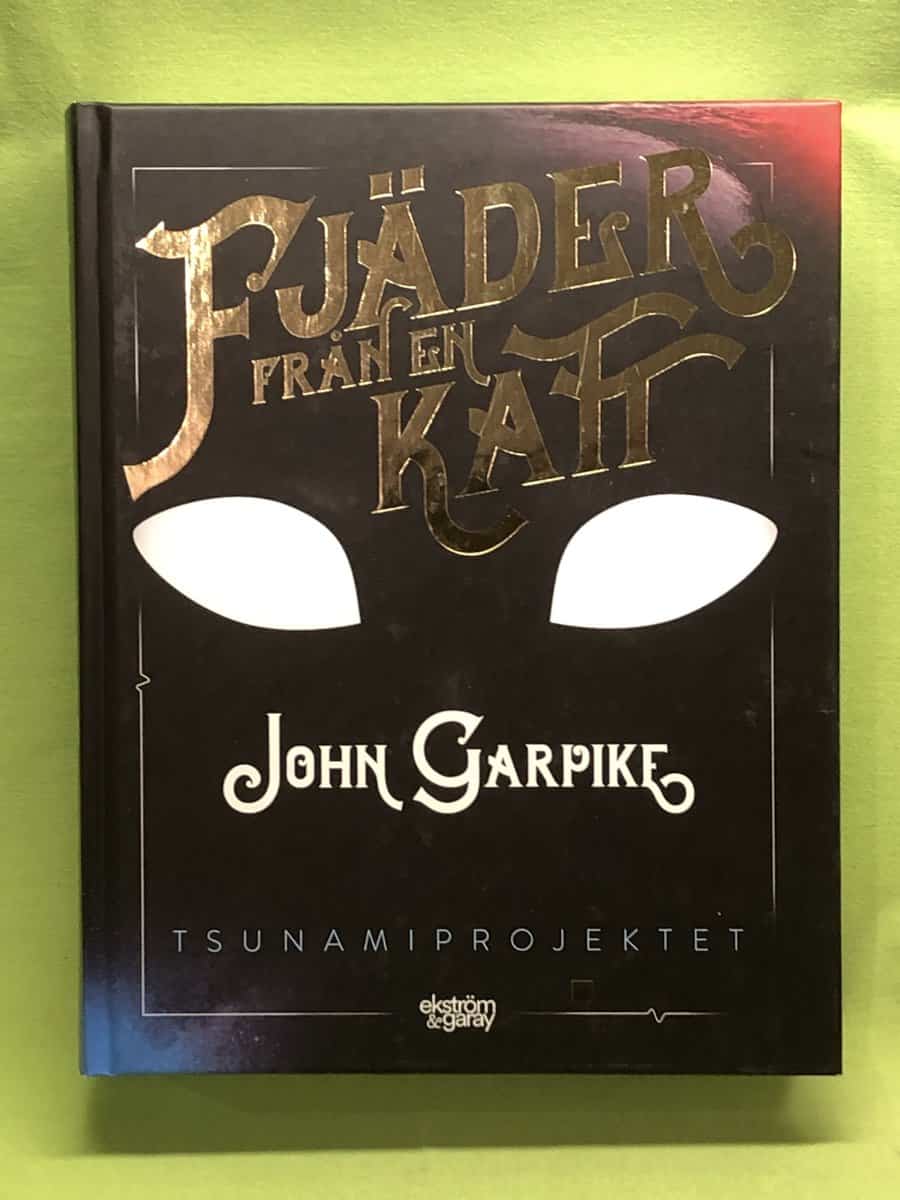 John Garpike : Fjäder från en katt