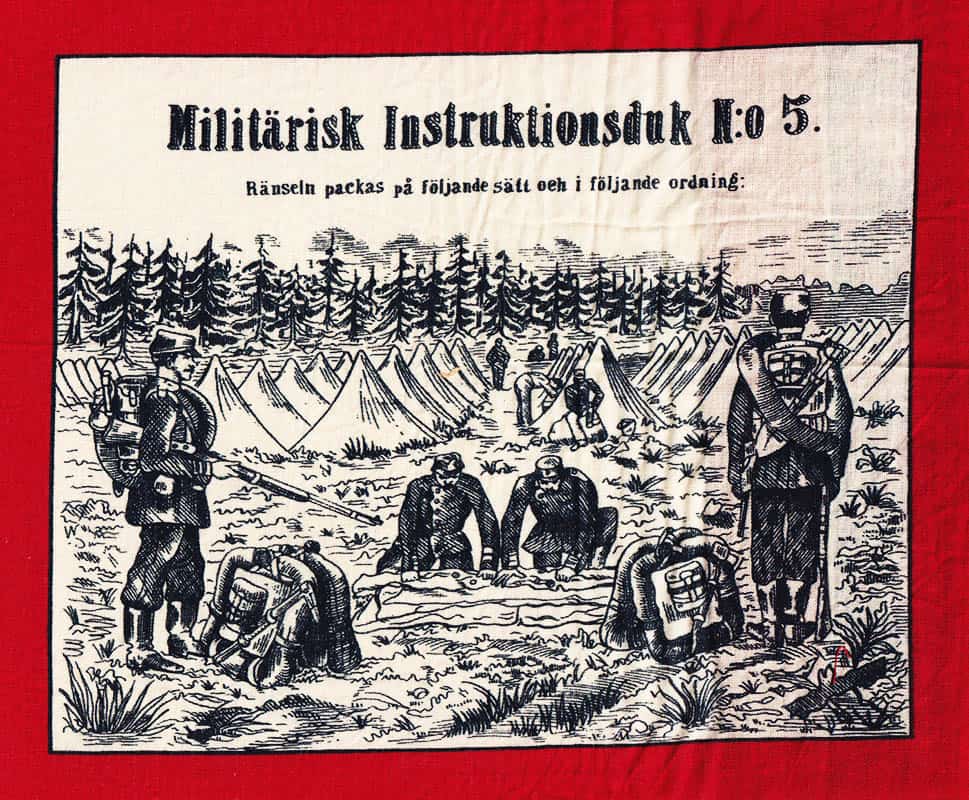 Militärisk instruktionsduk N:o 5. Ränseln packas på följande sätt och i följande ordning [= text i dukens mitten]
