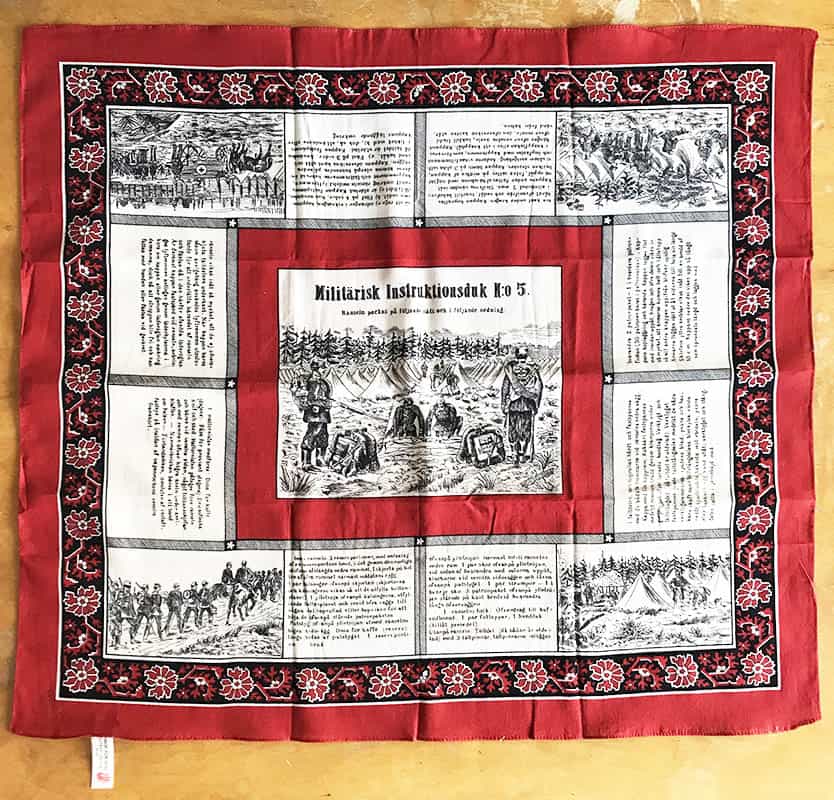 Militärisk instruktionsduk N:o 5. Ränseln packas på följande sätt och i följande ordning [= text i dukens mitten]