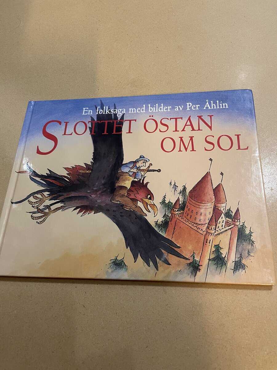 Per Åhlin : Slottet östan om sol - en folksaga från södra Småland