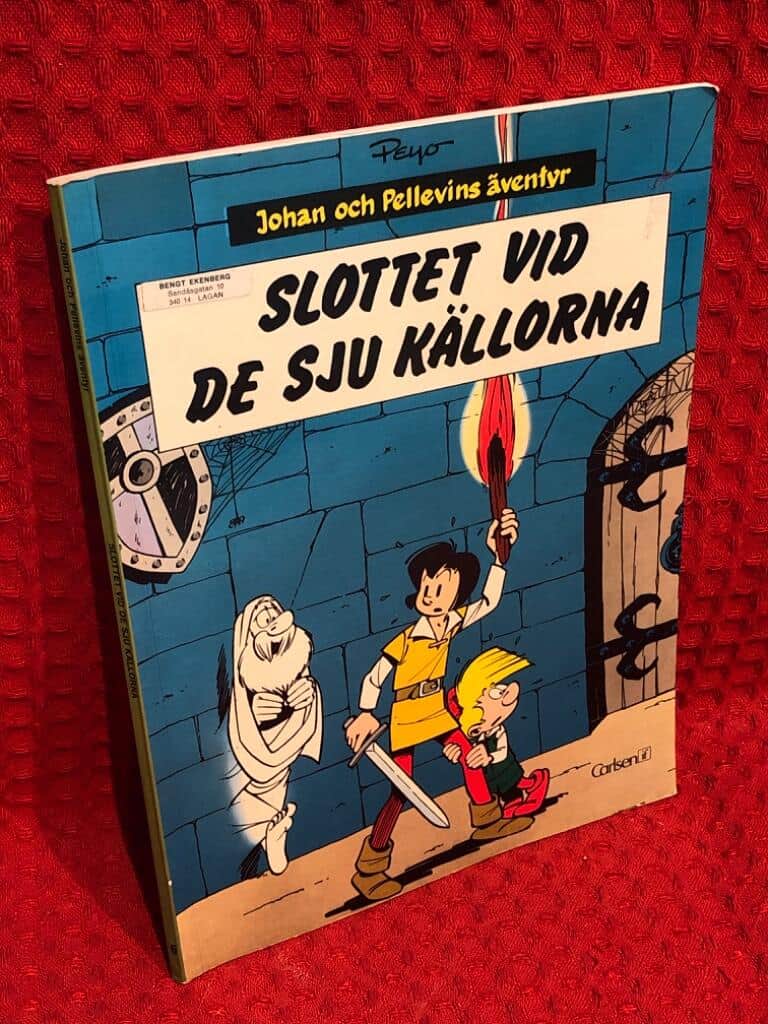 Peyo, 1928-1992 ; Emond, Ingrid : Slottet vid de sju källorna