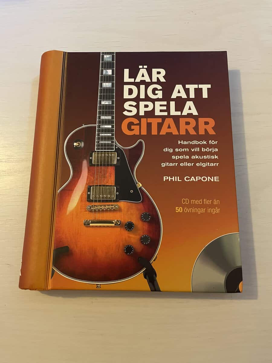 Phil Capone : Lär dig att spela gitarr handbok för dig som vill börja spela akustisk gitarr eller elgitarr