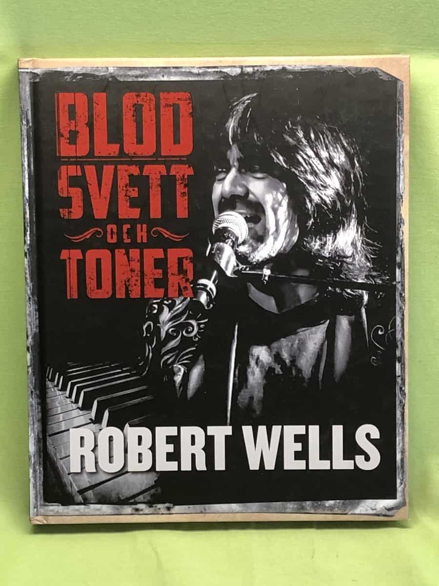 Robert Wells : Blod, svett och toner
